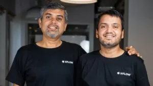 Plataforma fintech Xflow gestionando pagos B2B internacionales con panel de divisas y transferencias globales