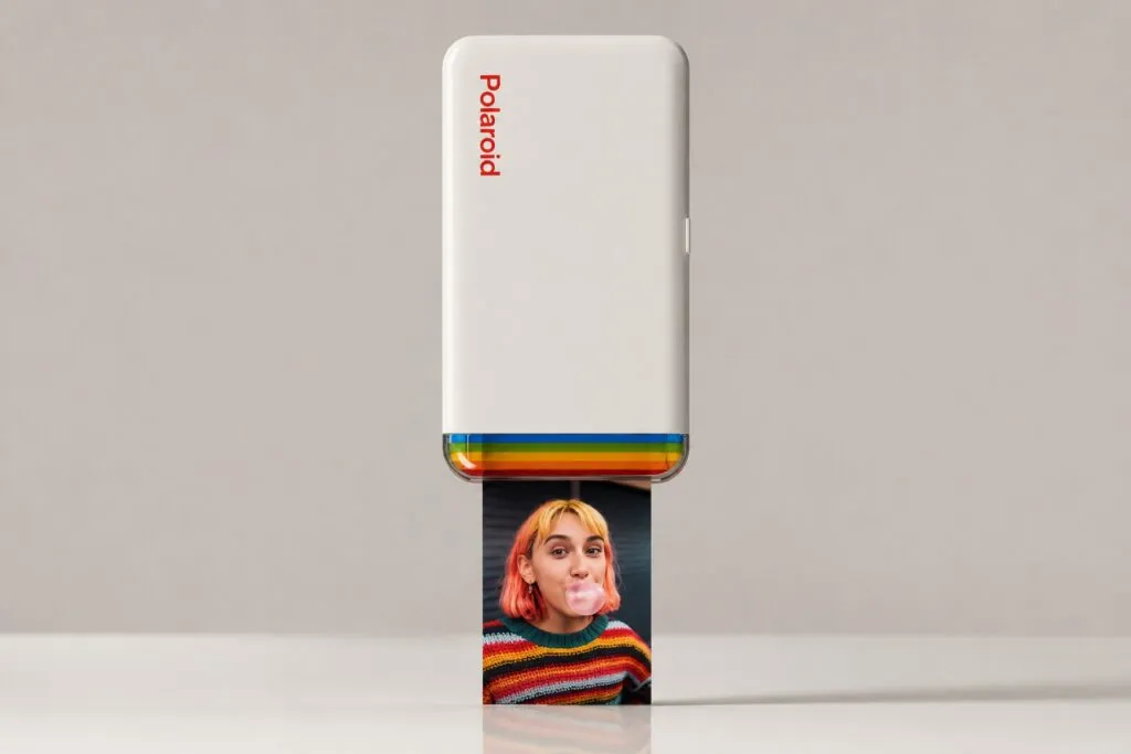 Impresora Polaroid portátil imprime fotos desde el celular con alta calidad y conexión móvil.